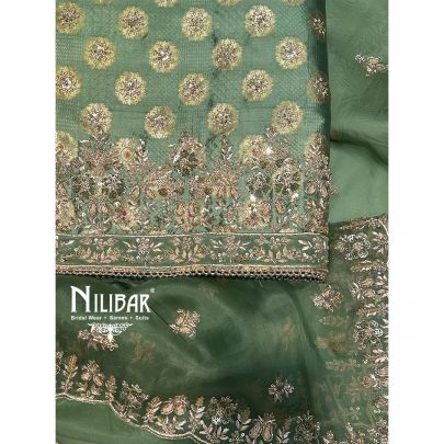 Green Banarasi Silk Unstitched Suit Paired With Organza Dupatta