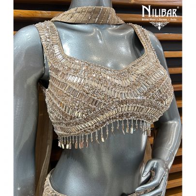 Beige Gold Net Lehenga Paired With Organza Dupatta