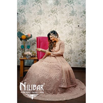 Salmon Pink Net Peplum Lehenga