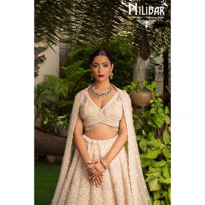 Ivory Net Embroidered Lehenga
