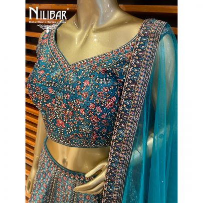 Hunter Green Net and Silk Lehenga