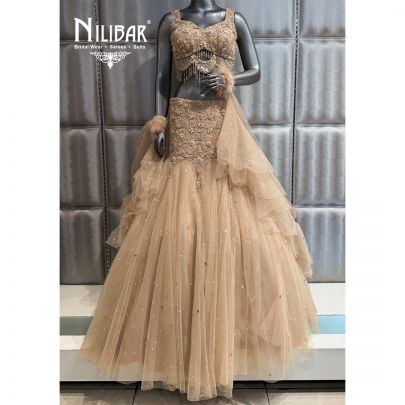 Beige Net Crop Top Paired With Fish Cut Lehenga