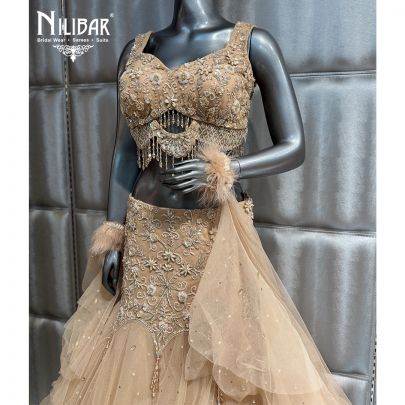 Beige Net Crop Top Paired With Fish Cut Lehenga
