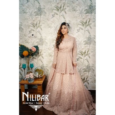 Salmon Pink Net Peplum Lehenga
