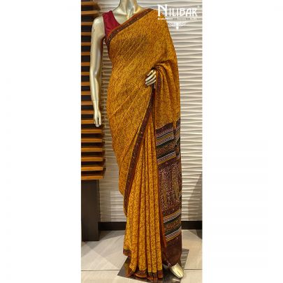 Mustard Chinon Stitched Saree  embellished with print work.