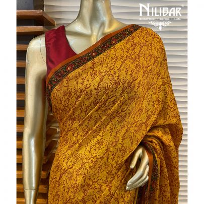 Mustard Chinon Stitched Saree  embellished with print work.