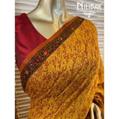 Mustard Chinon Stitched Saree  embellished with print work.