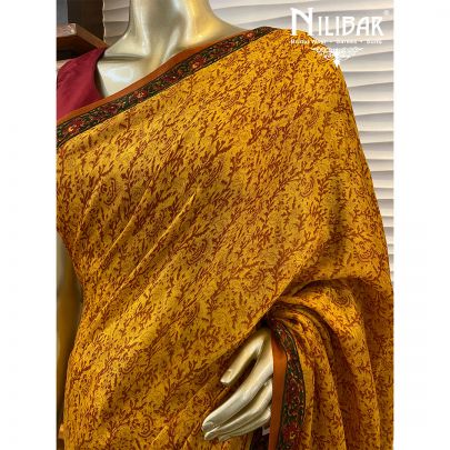 Mustard Chinon Stitched Saree  embellished with print work.