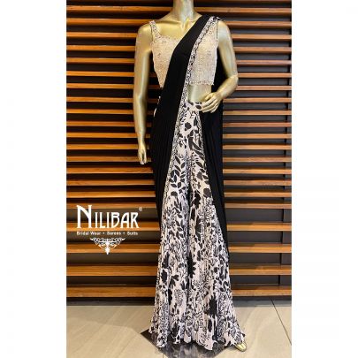 White and Black Georgette Draped Saree embellished with mirror, pearl, sequin, cutdana and dabka work.