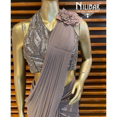 Gray Organza Draped Saree   embellished with cutdana, sequin and beads work.