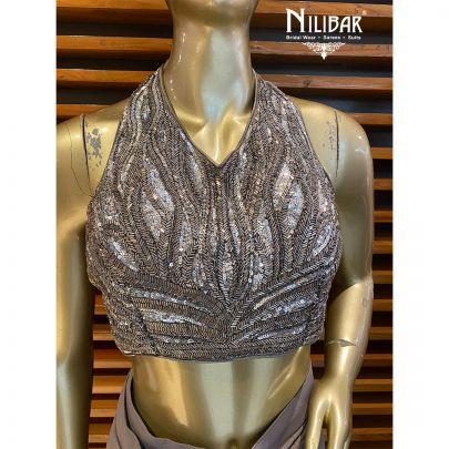 Gray Organza Draped Saree   embellished with cutdana, sequin and beads work.