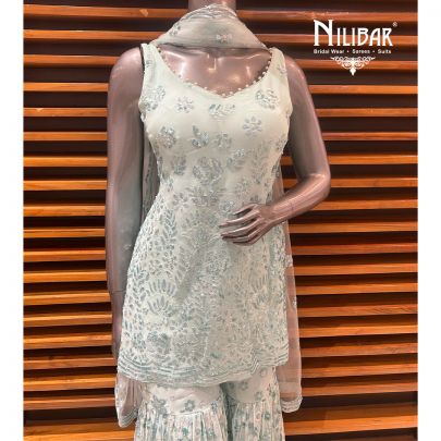 Light Blue Georgette Garara Suit Paired With Net Dupatta