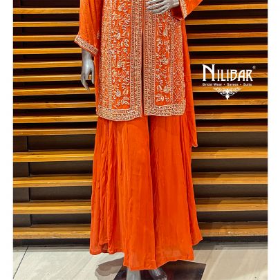 Orange Chinon Palazzo Suit Paired With Net Dupatta