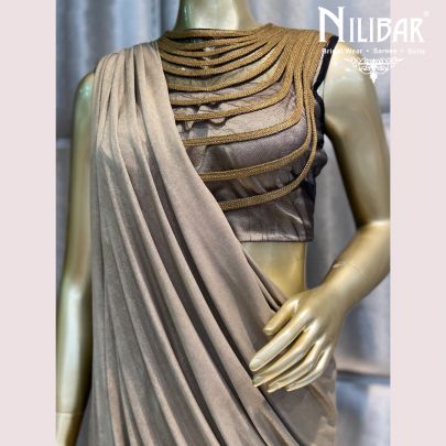 Golden Chantilly Net Draped Saree