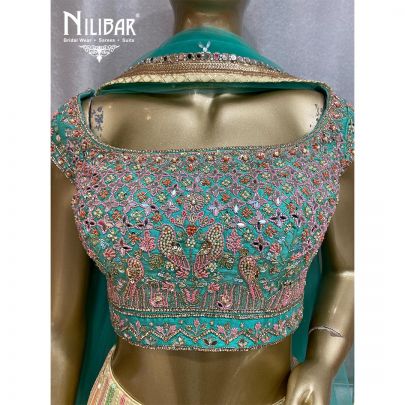 Cream Yellow and Emerald Green Georgette and Net Lehenga