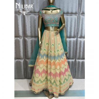 Cream Yellow and Emerald Green Georgette and Net Lehenga