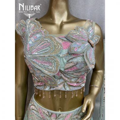 Mint Green Net Lehenga's
