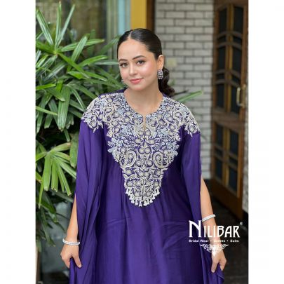 Kritika Kanu in Our Purple Satin Drape Set