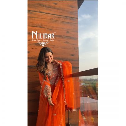 Neha Bhandari in Our Orange Silk Anarkali Suit