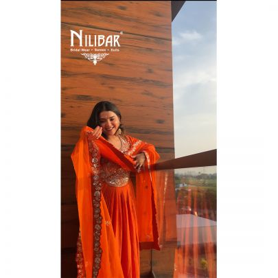 Neha Bhandari in Our Orange Silk Anarkali Suit