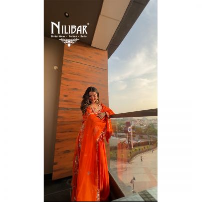 Neha Bhandari in Our Orange Silk Anarkali Suit