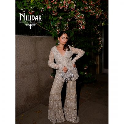 Gouri Kumar In Our Beige Net Heavy Embroidered Top Paired With Pants
