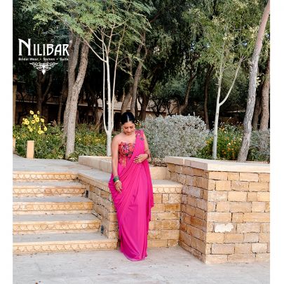 Hot Pink Silk Corset Blouse Paired With Lycra Drape Saree