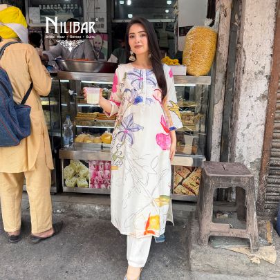 Ivory Rayon Cotton Printed Kurta Paired With Straight Palazzo