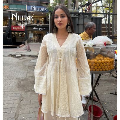 Ivory Peplum Chikankari Top Paired With Loose Palazzo