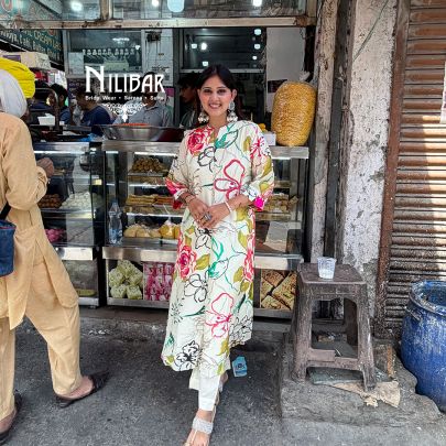 Ivory Rayon Cotton Printed Kurta Paired With Straight Palazzo