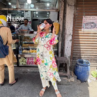 Ivory Rayon Cotton Printed Kurta Paired With Straight Palazzo