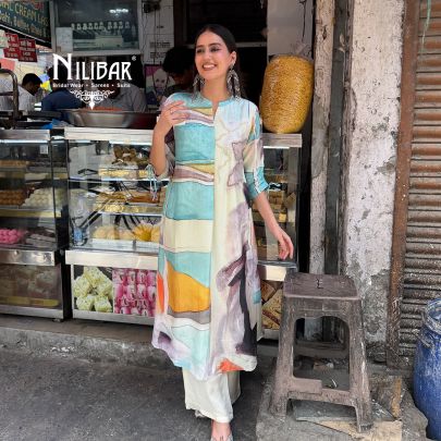 Ivory Rayon Cotton Printed Kurta Paired With Straight Palazzo