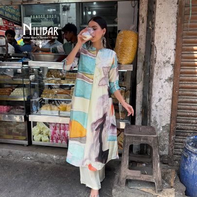 Ivory Rayon Cotton Printed Kurta Paired With Straight Palazzo