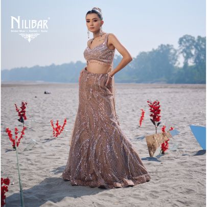 Beige Gold Net Lehenga Paired With Organza Dupatta