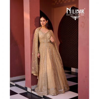 Gold Soft Net long jacket paired with lehenga
